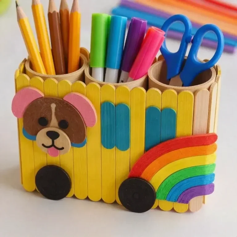 Colorful Popsicle-Stick Organizer craft featuring a rainbow puppy school bus for kids