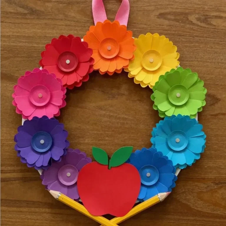 Rainbow cupcake-liner flower wreath crafted for children's activities